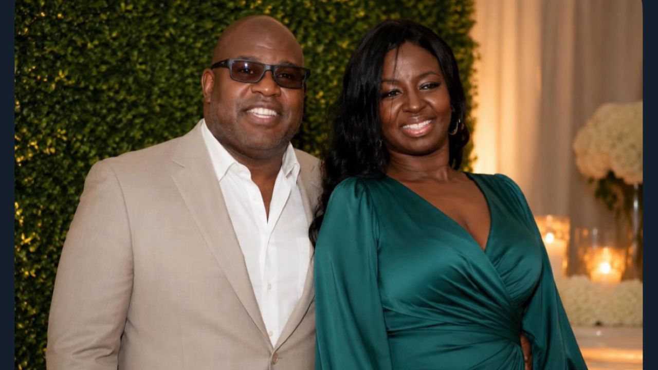 Eric Bieniemy posing with his beloved wife, Mia Bieniemy.