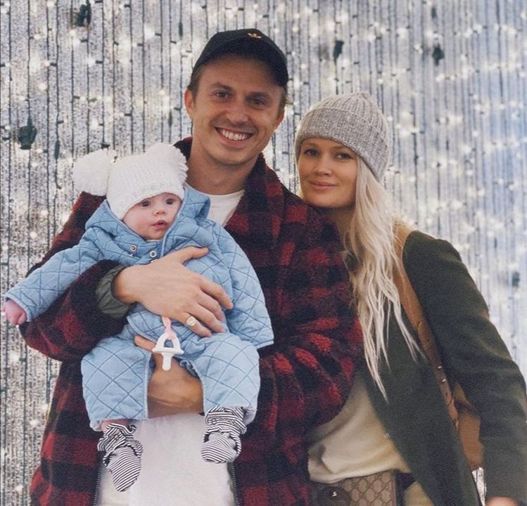 Lauren Bennett with her husband and daughter.