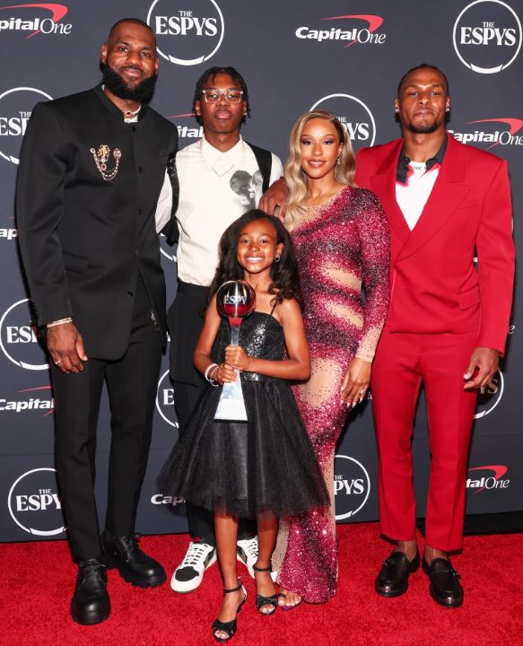 LeBron James with his wife, Savannah, and their three kids.
