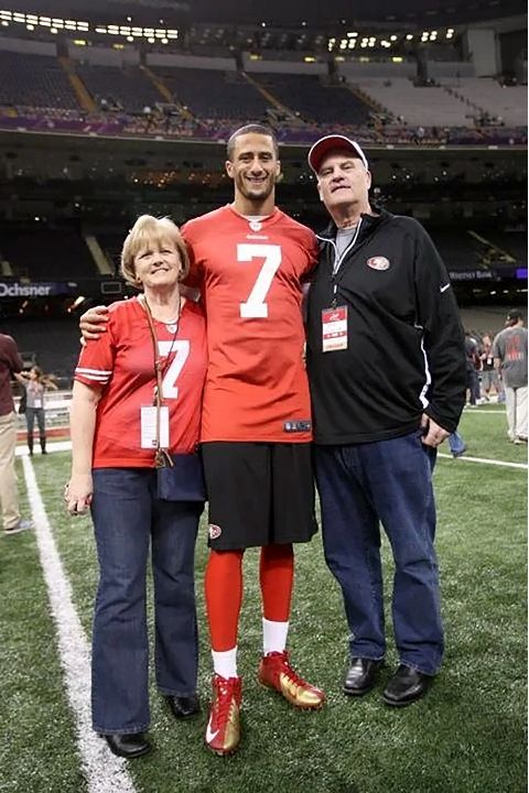 Colin Kaepernick with his parents.